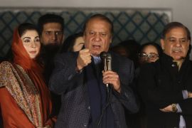Three-time former Prime Minister Nawaz Sharif delivers a speech on Friday, flanked by his daughter Maryam Nawaz and brother Shehbaz Sharif