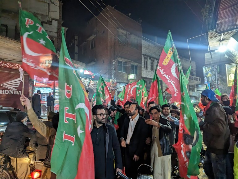 PTI candidate Muhammed Azam Madni leading a rally in Lahore on the last day of campaigning on February 6. [Abid Hussain / Al Jazeera]