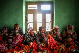 The elders of Dadkhai village, in the Himalayan mountains, gather for a wedding-fixing ceremony at the house of the Sharief family [Sharafat Ali]