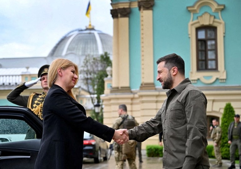 Ukraine's President Volodymyr Zelenskiy shakes hands with Slovakia's President Zuzana Caputova before their meeting, as Russia's attack on Ukraine continues, in Kyiv, Ukraine May 31, 2022. Ukrainian Presidential Press Service/Handout via REUTERS ATTENTION EDITORS - THIS IMAGE HAS BEEN SUPPLIED BY A THIRD PARTY. MANDATORY CREDIT