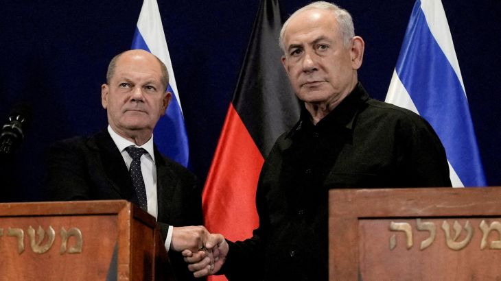 German Chancellor Olaf Scholz, left, shakes hands with Israeli Prime Minister Benjamin Netanyahu, during a press conference in Tel Aviv, Israel, Tuesday, Oct. 17, 2023.