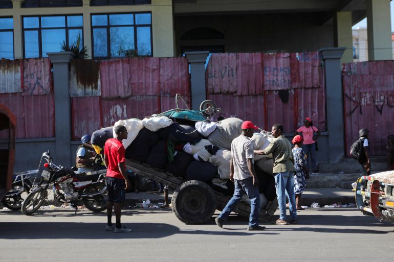 Residents organise their belongings as they flee gang violence in Haiti's capital Port-au-Prince