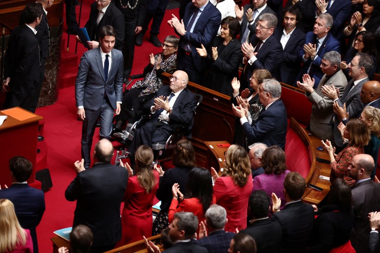 French Prime Minister Gabriel Attal is applauded by members of parliament after his speech during a special congress gathering both the upper and lower houses of the French parliament 