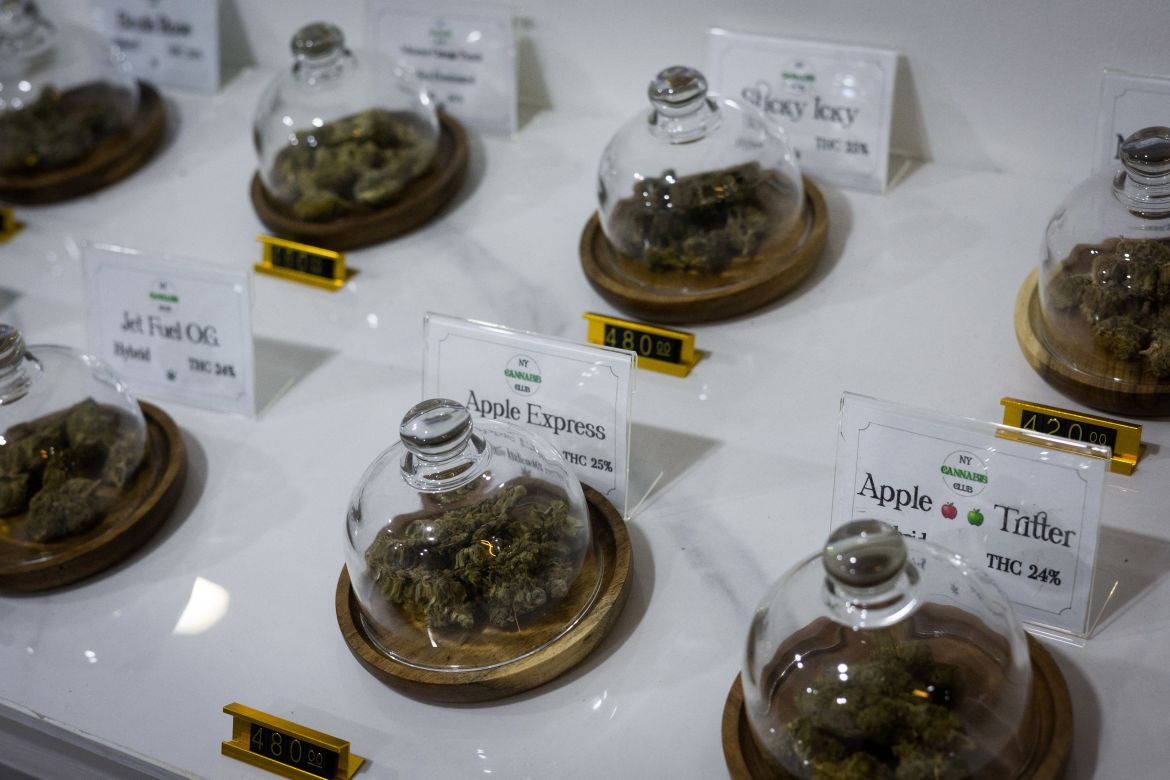 Different cannabis strains are displayed in a shop in Phuket, Thailand