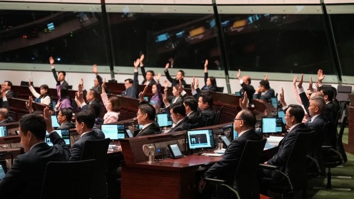 Lawmakers vote during the second reading of Safeguarding National Security Bill, also referred to as Basic Law Article 23, at the Hong Kong’s Legislative Council, in Hong Kong, China March 19, 2024.