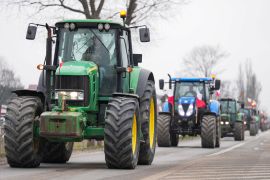 Polish farmers use tractors as they protest against imports of Ukrainian agricultural products, in Zakret, near Warsaw, Poland [Aleksandra Szmigiel/Reuters]