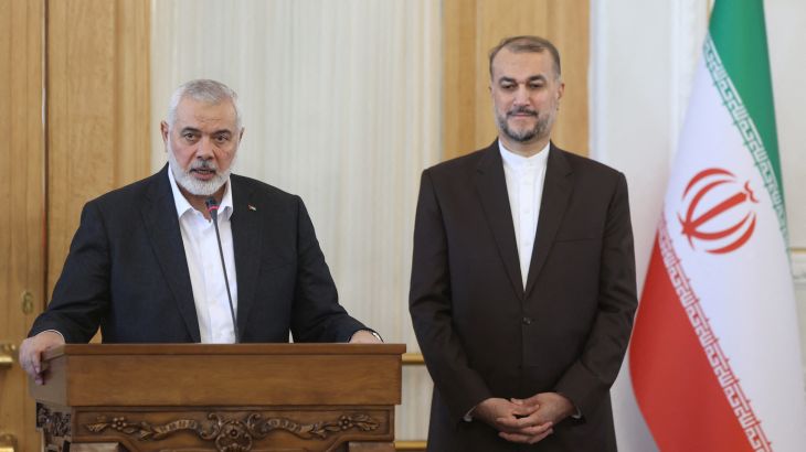 Palestinian group Hamas' top leader, Ismail Haniyeh speaks during a press conference in Tehran.