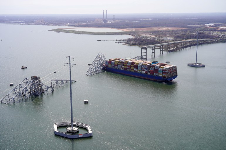 Aerial view of the Dali cargo vessel which crashed into the Francis Scott Key Bridge, causing it to collapse in Baltimore, Maryland, U.S., March 26, 2024. Maryland National Guard/Handout via REUTERS. THIS IMAGE HAS BEEN SUPPLIED BY A THIRD PARTY
