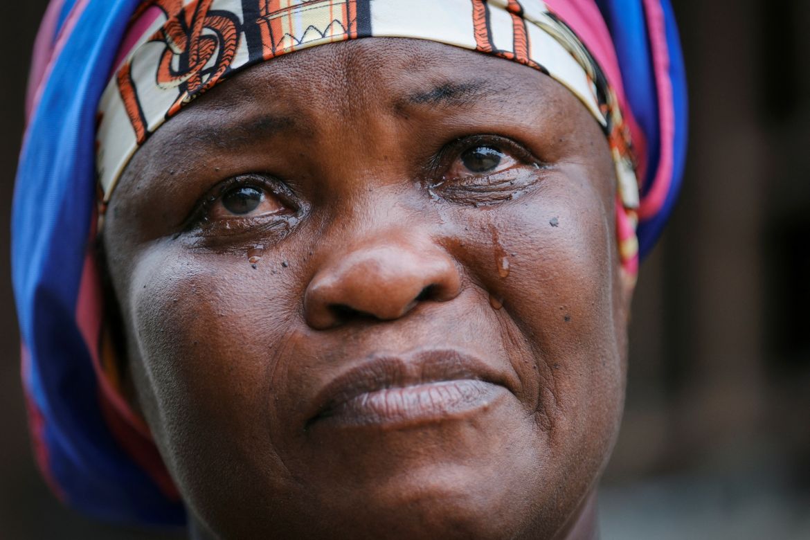 Janet Gyamfi, 52, a cocoa farmer, cries at her home as she recounts the destruction of her cocoa plantation by illegal gold mining activities in the Samreboi community in the Western Region, Ghana, February 26