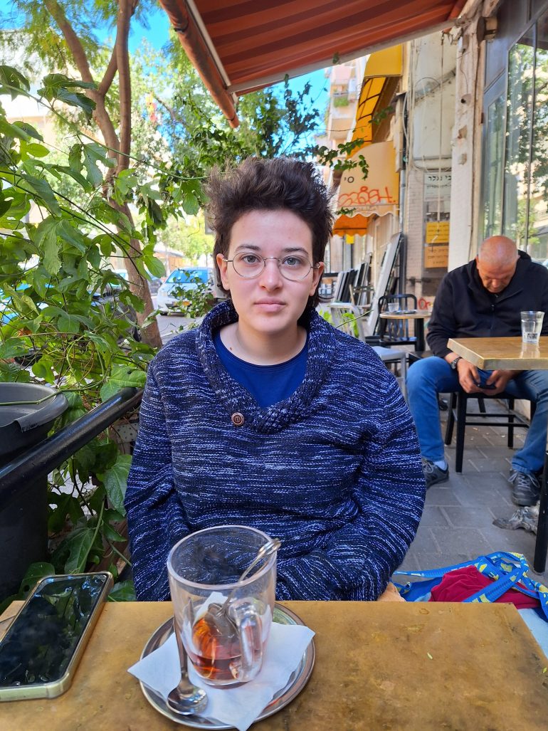Einat Gerlitz is a 20-year-old peace activist and a conscientious objector. She spoke about her peace activism in a café in Tel Aviv. [Al Jazeera/Mat Nashed]