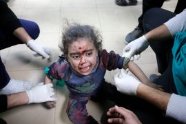 Palestinian child wounded by an Israeli attack is brought to Al-Aqsa hospital in Deir el-Balah [Ashraf Amra/Anadolu]