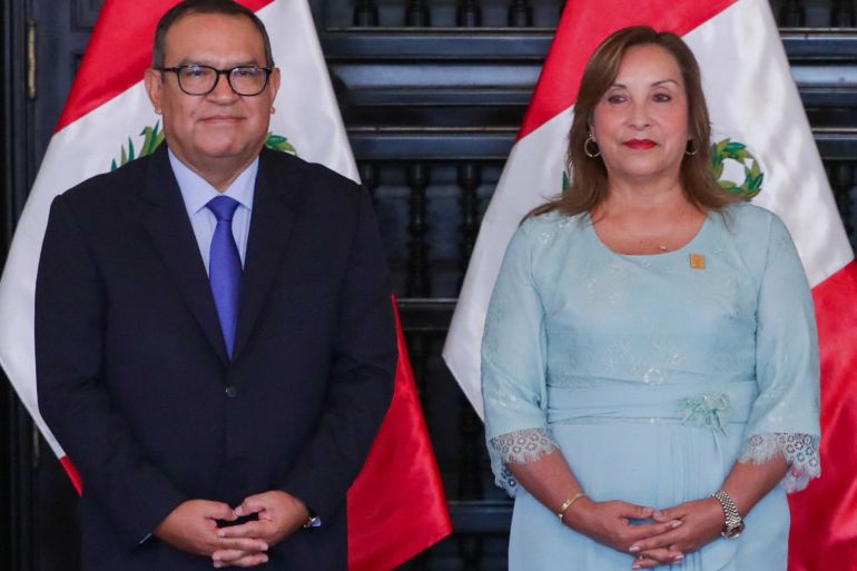 Peru's Prime Minister Alberto Otarola (L) during a ceremony with President Dina Boluarte at the Palace of Government in Lima on March 1, 2024
