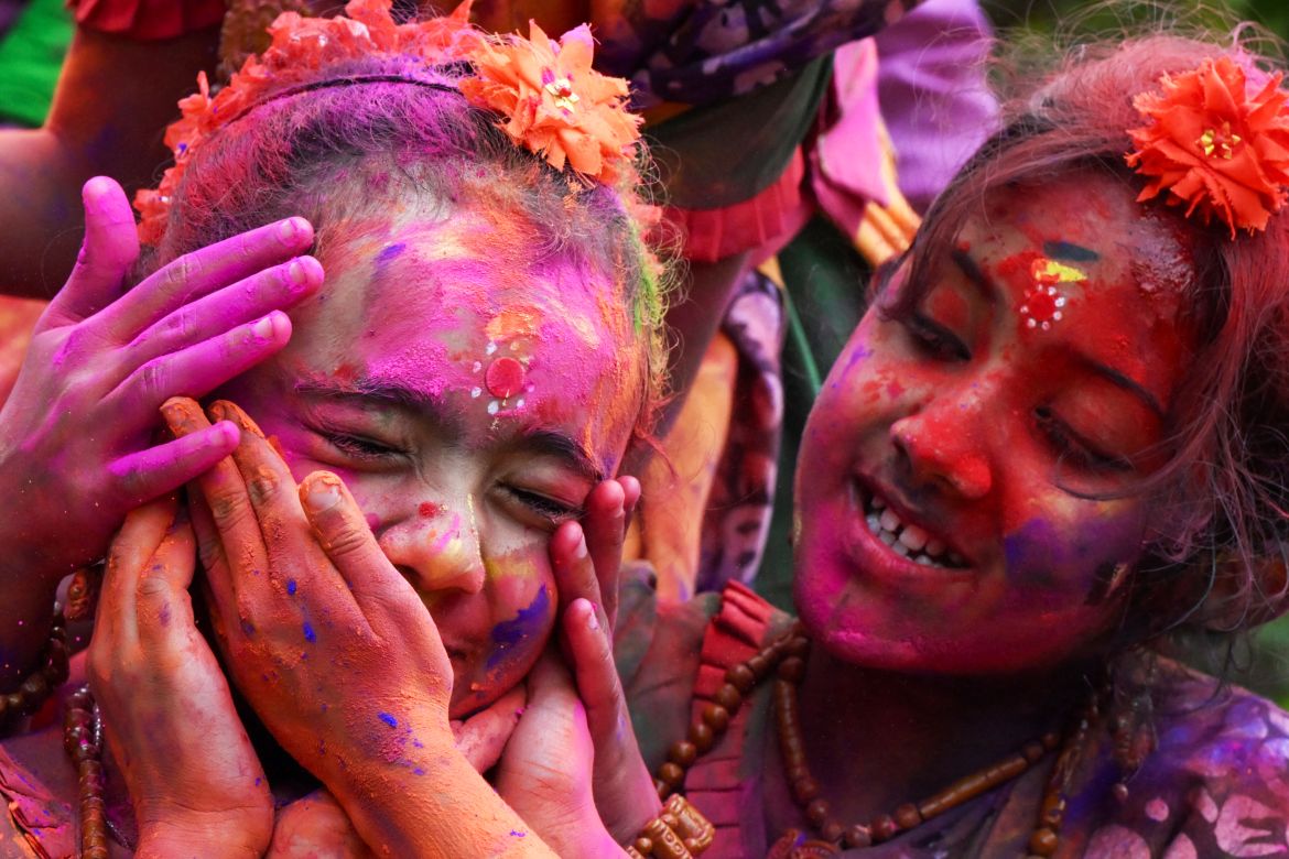 Girls smeared with Gulal' as they celebrate Holi, the Hindu spring festival of colours, in Kolkata