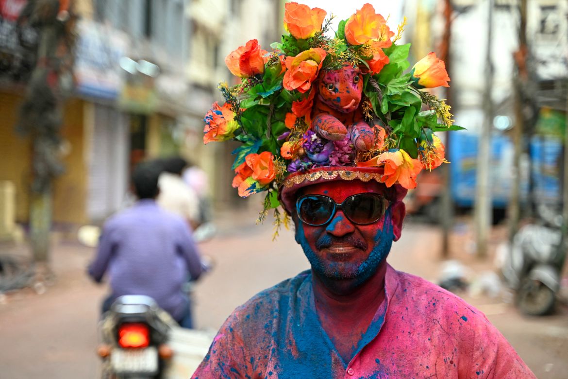 A man is smeared with Gulal' as he celebrates Holi, the Hindu spring festival of colours, in Hyderabad