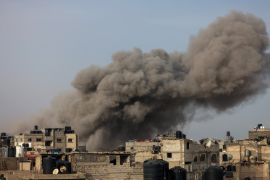 Smoke billows over Rafah, in the southern Gaza Strip, following an Israeli bombardment on March 27, 2024 [Mohammed Abed/AFP]