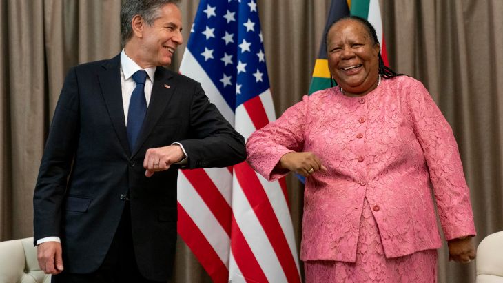 Secretary of State Antony Blinken is greeted by South Africa's Foreign Minister Naledi Pandor.