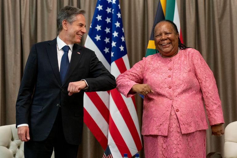 Secretary of State Antony Blinken is greeted by South Africa's Foreign Minister Naledi Pandor.