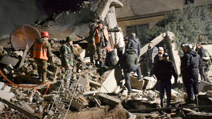 People gather to rescue others after Israeli airstrikes in Homs
