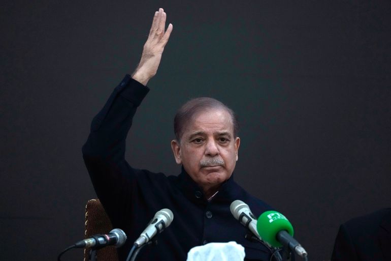 Pakistan's former Prime Minister Shehbaz Sharif gestures during a press conference regarding parliamentary elections, in Lahore, Pakistan, Tuesday, Feb. 13
