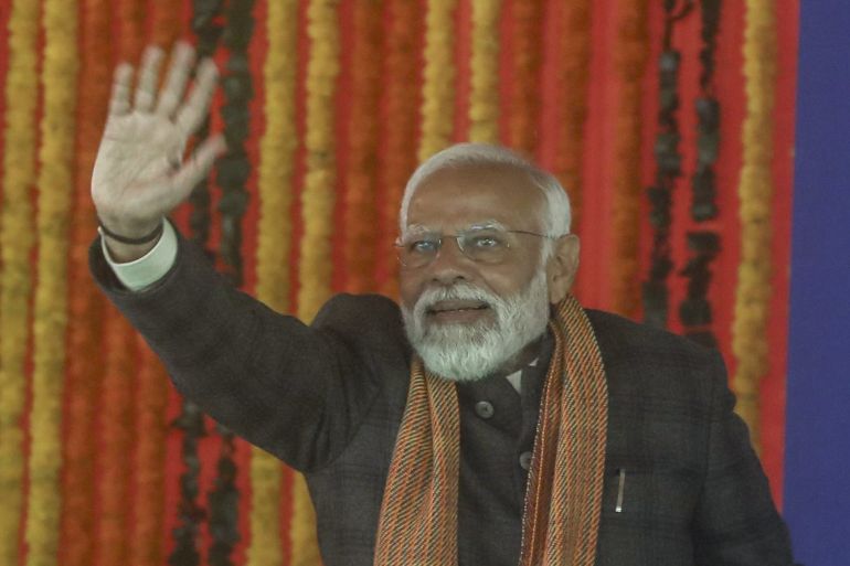 Indian Prime Minister Narendra Modi waves at a public rally at the Bakshi Stadium in Srinagar, Indian controlled Kashmir, Thursday, March 7, 2024. Modi on Thursday made his first official visit to Kashmir's main city since New Delhi stripped the disputed region of semi-autonomy and took direct control of it in 2019. (AP Photo)