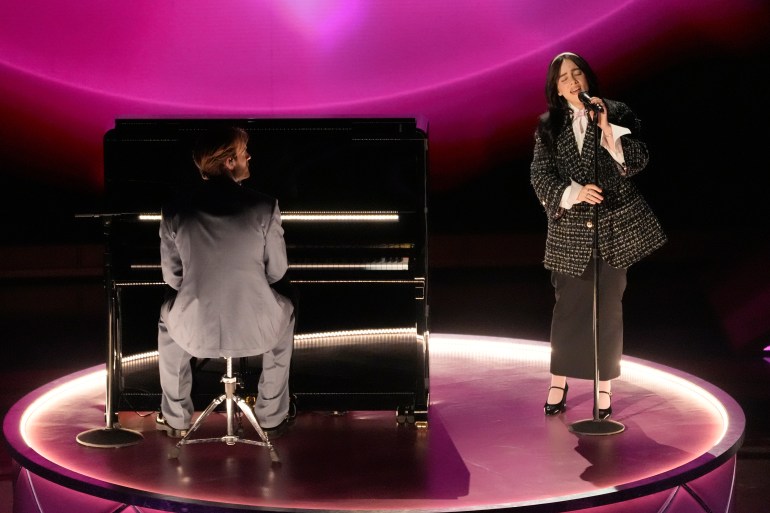 Billie Eilish and Finneas at the piano on Oscar stage