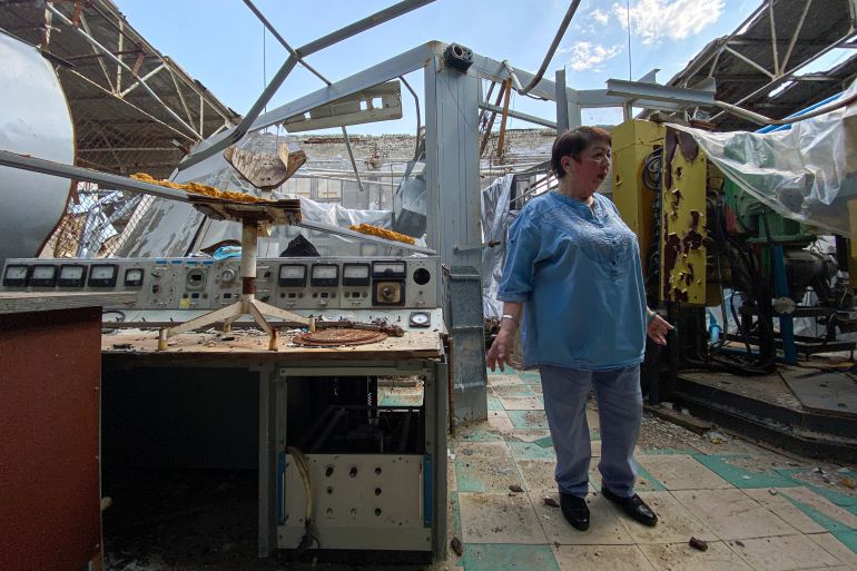 Galyna Tolstolutska, head of the department of radiation damage and radiation materials science at the National Scientific Center stands in her damaged lab.