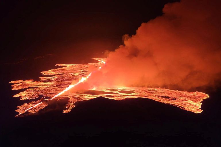 This image from video provided by Iceland Civil Defense shows lava erupting from a volcano between Hagafell and Stóri-Skógfell