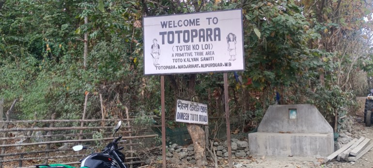 The entrance to Totopara, where generations of Totos have lived — but where they now fear they could be squeezed out [Gurvinder Singh/Al Jazeera]