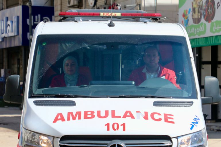 Lina Amro, left, and Jawdat al-Muhtaseb, right, in their ambulance