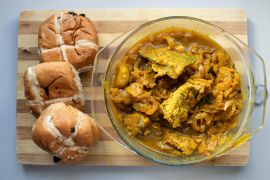 Pickled fish and hot cross buns - two favourites at Easter in South Africa [Shutterstock]