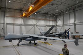 A US Air Force MQ-9 Reaper drone, one of the newest and most expensive in the US military arsenal, sits in a hanger at Amari Air Base, Estonia, on July 1, 2020 [Janis Laizans/Reuters]