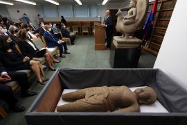 US Department of Homeland Security announce the repatriation of stolen antiquities to Cambodia in 2022. New York is a major trafficking hub, and several works have been seized in recent years from museums, including the prestigious Metropolitan Museum of Art, and collectors [File: Andrew Kelly/Reuters]