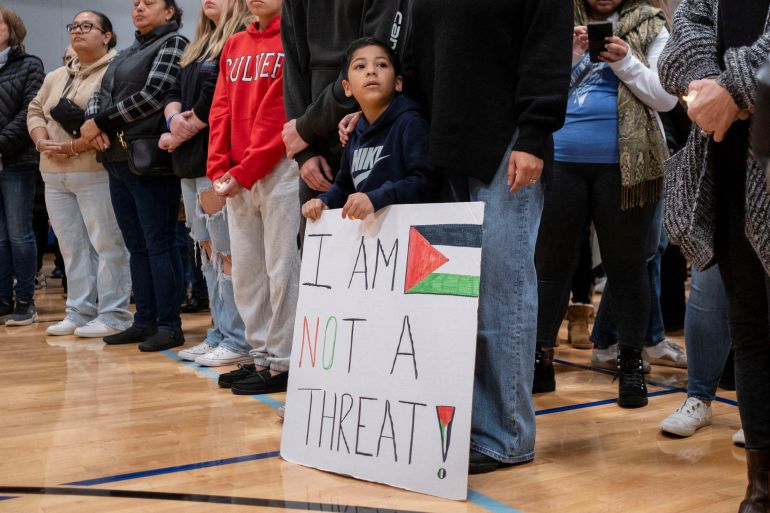 FILE PHOTO: Mourners attend a vigil service at the Prairie Activity &amp; Recreation Center for Wadea Al-Fayoume, 6, a Muslim boy who according to police was stabbed to death in an attack that targeted him and his mother for their religion and as a response to the war between Israel and Hamas, in Plainfield, Illinois, U.S. October 17, 2023. REUTERS/Jim Vondruska/File Photo