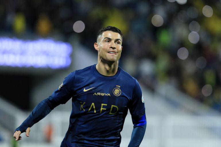 Al Nassr's Cristiano Ronaldo celebrates scoring their fourth goal to complete his hat-trick