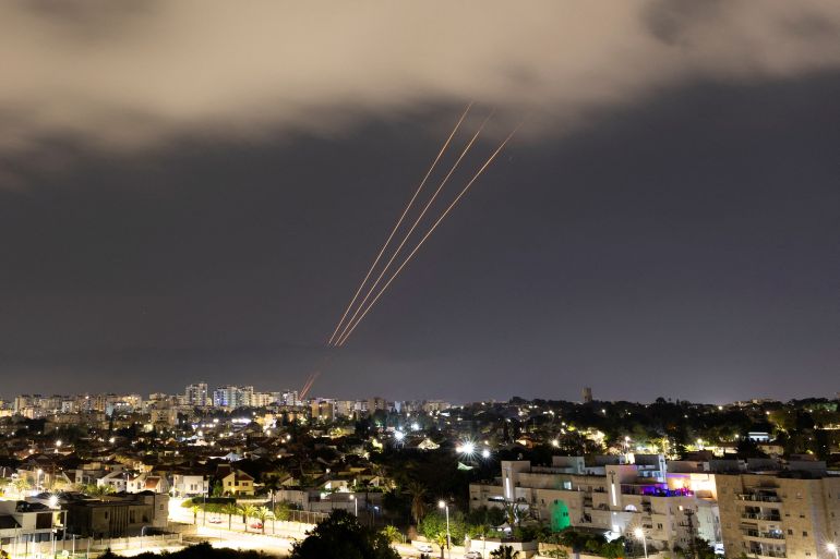 An anti-missile system operates after Iran launched drones and missiles towards Israel, as seen from Ashkelon, Israel April 14, 2024