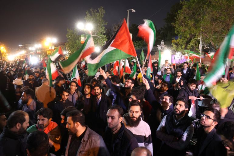 Iranian demonstrators attend an anti-Israeli gathering in front of the British Embassy in Tehran, Iran, April 14, 2024