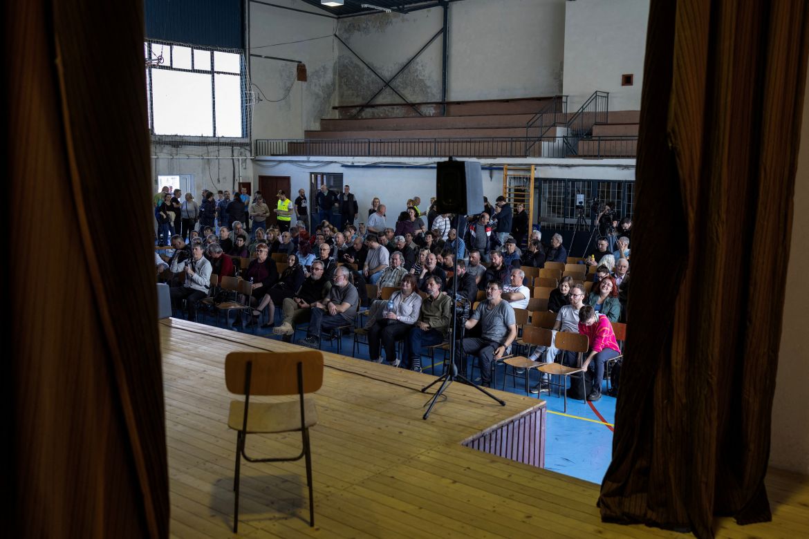 People attend a meeting about local ecological issues in a school gym in the village of Krivelj, Serbia, March 30