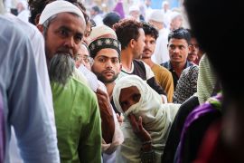 Voters wait outside a polling station to vote during the first phase of the general election in Kairana, in the northern Indian state of Uttar Pradesh, India, April 19, 2024. REUTERS/Anushree Fadnavis