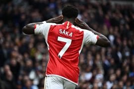 Arsenal&#039;s Bukayo Saka celebrates scoring their second goal [Dylan Martinez/Reuters]