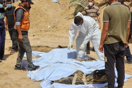 Civil Defense teams uncover 51 more bodies on Wednesday from a mass grave at Nasser [Hani Alshaer/Anadolu]