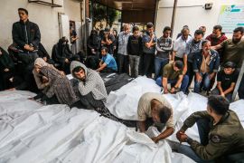 Relatives of Palestinian victims who were killed in Israeli airstrike, take their bodies from morgue of El-Najar Hospital in Rafah on April 29, 2024. [Abed Rahim Khatib/Anadolu Agency]