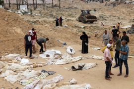 Bodies are lined up for identification after they were unearthed from a mass grave found in the Nasser Medical Complex in the southern Gaza Strip on April 25, 2024 [AFP]