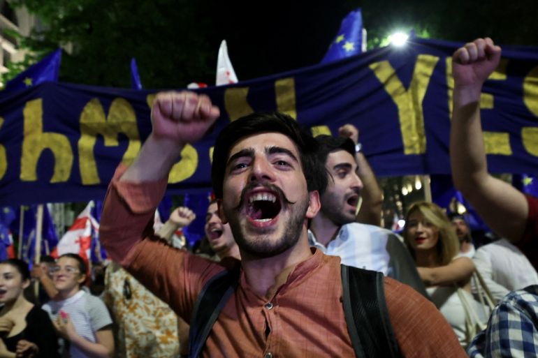 Georgians march 'for Europe', protest controversial bill
