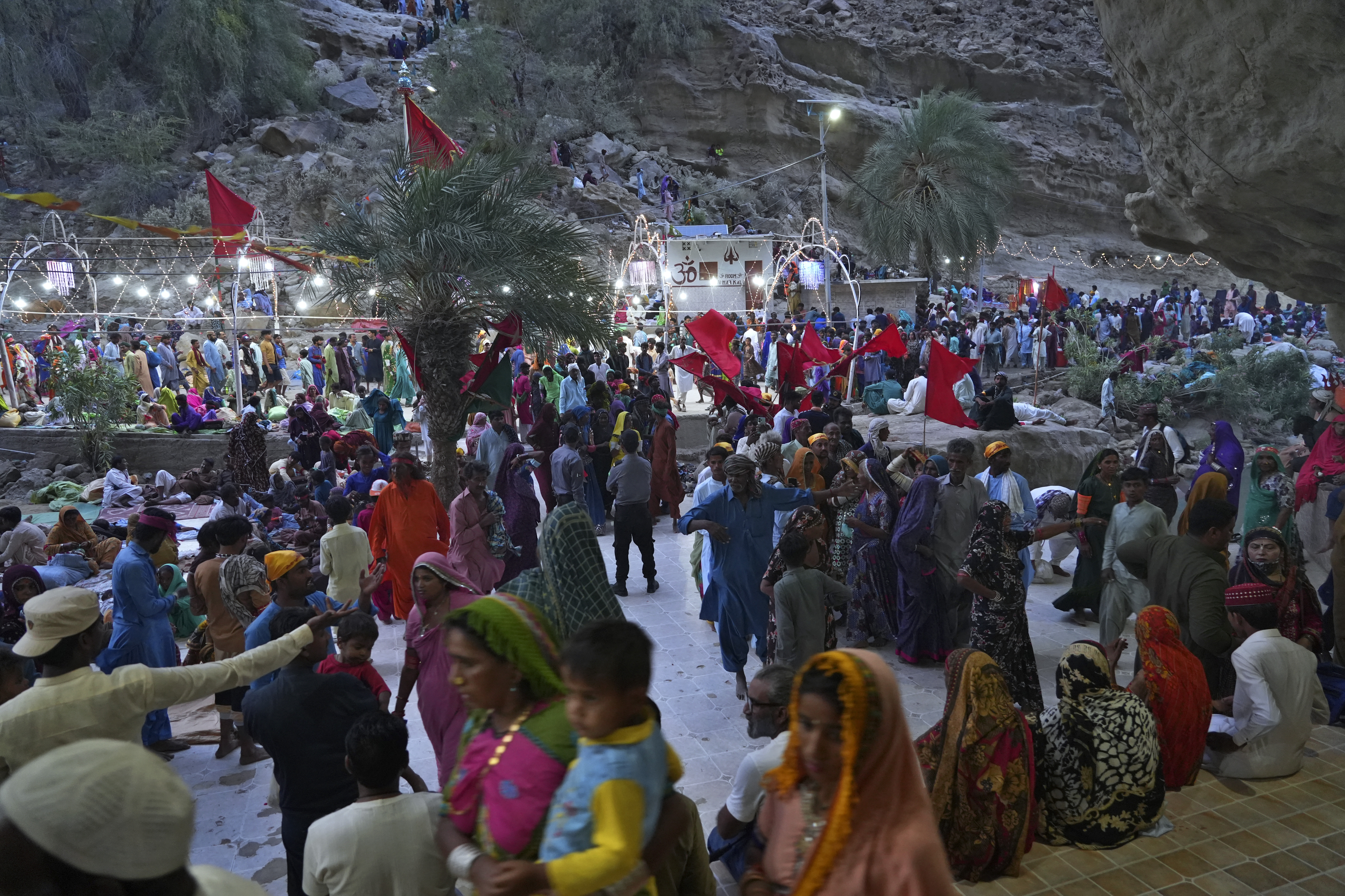 Hindu devotees arrive at an ancient cave temple of Hinglaj Mata to attend an annual festival in Hinglaj in Lasbela district in Pakistan's southwestern Baluchistan province, Friday, April 26
