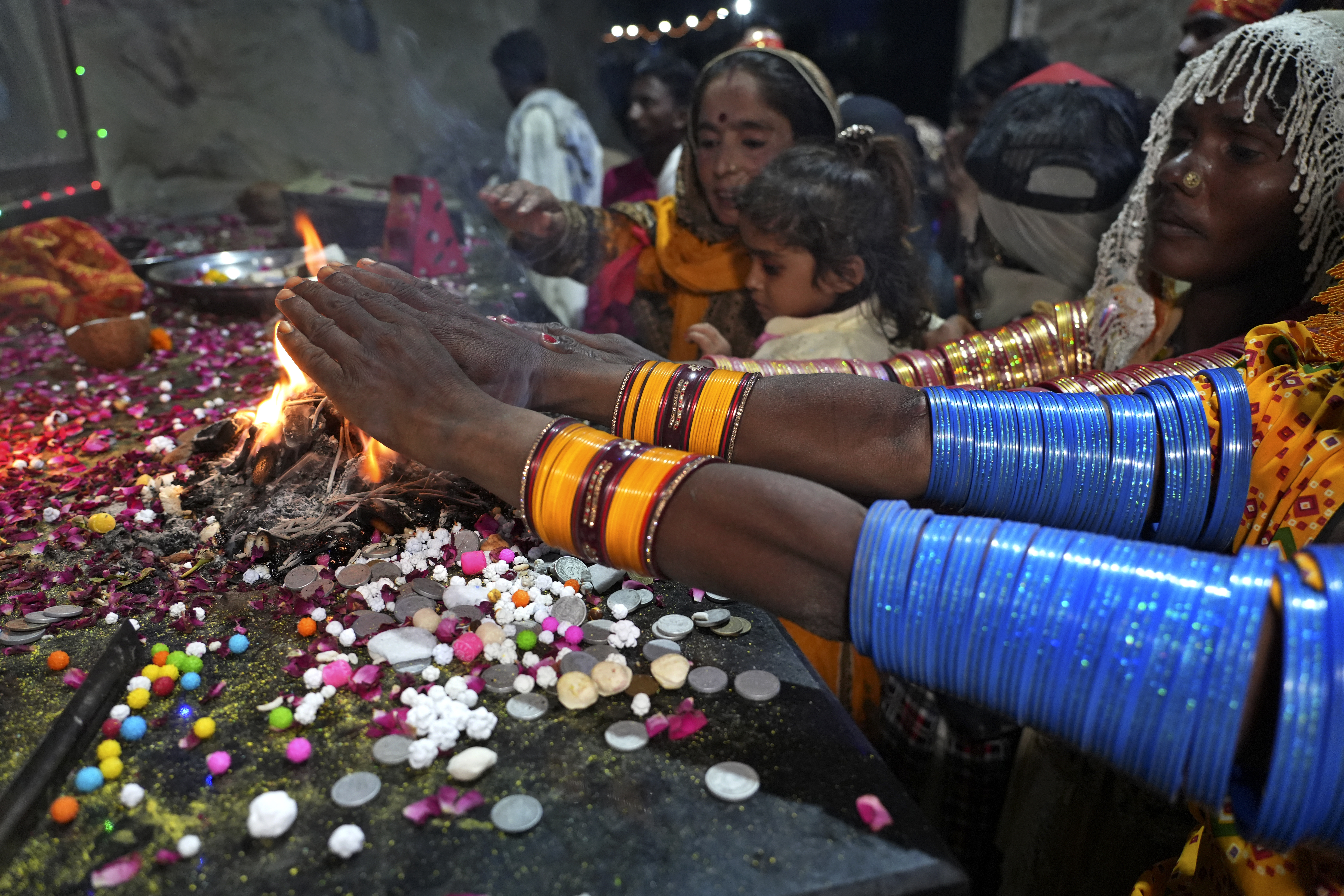 Hindu devotees perform their rituals during an annual festival in an ancient cave temple of Hinglaj Mata in Hinglaj in Lasbela district in Pakistan's southwestern Baluchistan province, Friday, April 26