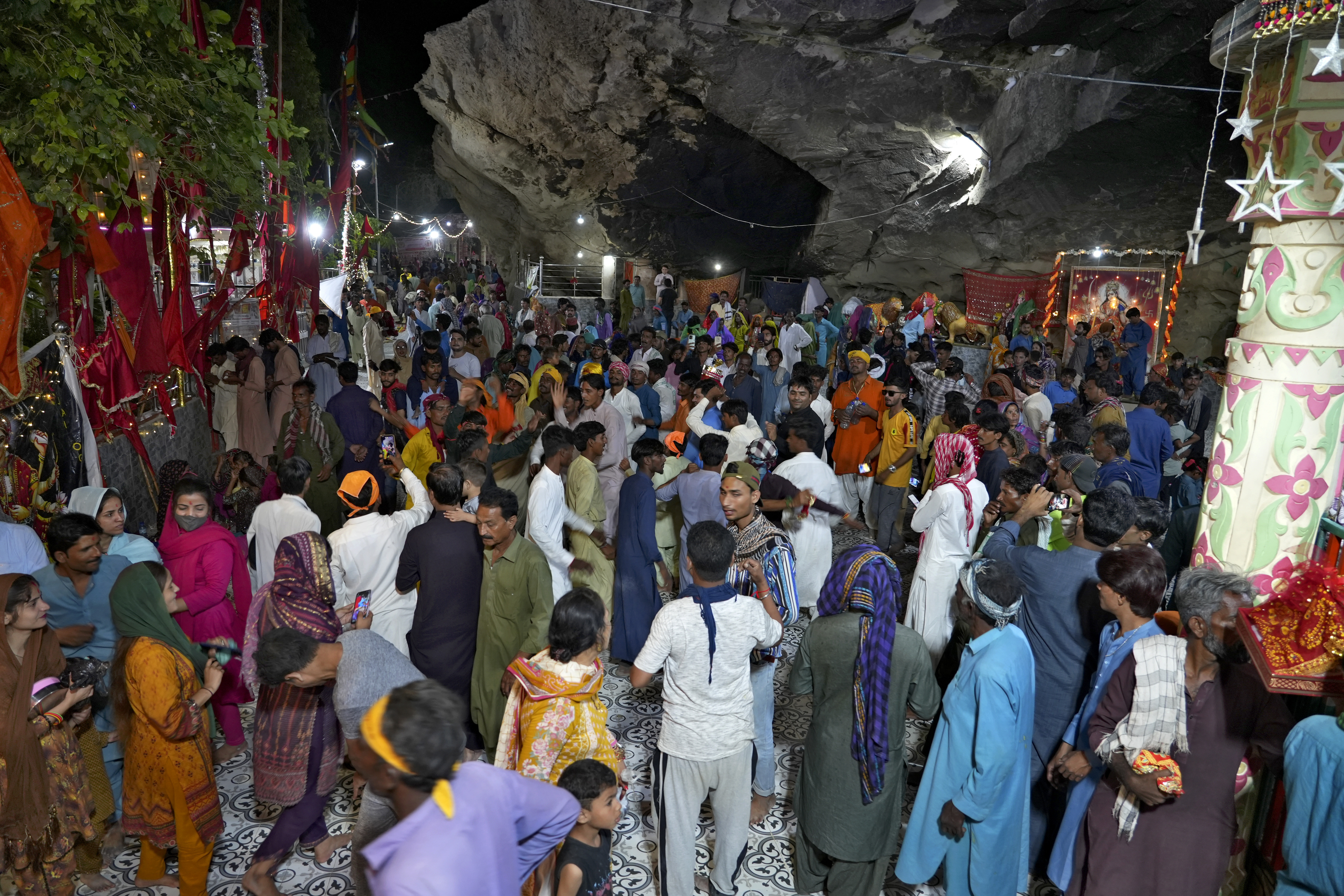 Hindu devotees attend an annual festival in an ancient cave temple of Hinglaj Mata in Hinglaj in Lasbela district in the Pakistan's southwestern Baluchistan province, Friday, April 26