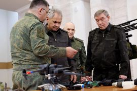 Russian Defence Minister Sergei Shoigu and armed forces chief Valery Gerasimov inspect new types of weapons in Rostov-on-Don, Russia, on May 1, 2024 [Russian Defence Ministry/Handout/Reuters]