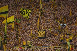 Borussia Dortmund fans hope to see their side win the Champions League for the second time [Thilo Schmuelgen/Reuters]