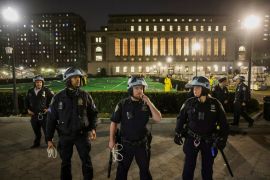 Police stand guard on April 30, 2024, at Columbia University, where a building had been occupied and protest encampment set up in support of Palestinians [Caitlin Ochs/Reuters]