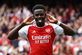 Arsenal&#039;s Bukayo Saka celebrates scoring their first goal [Paul Childs/Reuters]